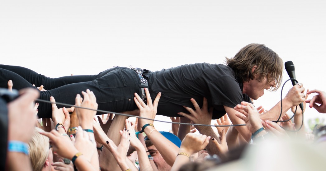 Crowd surfing at Forecastle with Cage the Elephant