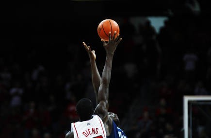 Gorgui Dieng and Mouphtaou Yarou jump for the tip off as the Louisville men&#039;s basketball team took on Villanova at the KFC Yum! Center Wednesday January 25, 2012. Louisville won the game 84-74. Photo by Jeff Sainlar