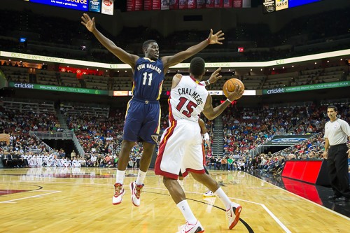 Jrue Holliday (11) and his defensive effort made Mario Chalmers pass the ball.