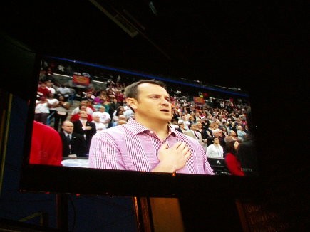 Coach Jeff Walz in his famed red and white stripe shirt.