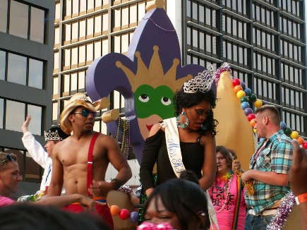Mister and Miss KPF 2013 wave to the crowd aboard the KPF float, last seen at the 2013 Pegasus Parade.