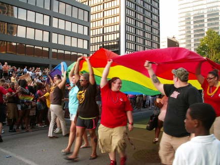 This was the first year UPS participated in the parade, and were given the honor of delivering the massive Pride flag through the city.