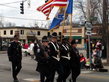 The LMPD color guard followed the Marines at the head of the parade.