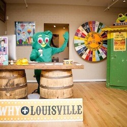 Gumby at the front desk of WHY Lou Two