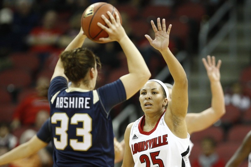 Louisville Guard Tia Gibbs (25) guards Quinnipiac&#039;s Gillian Abshire (33)