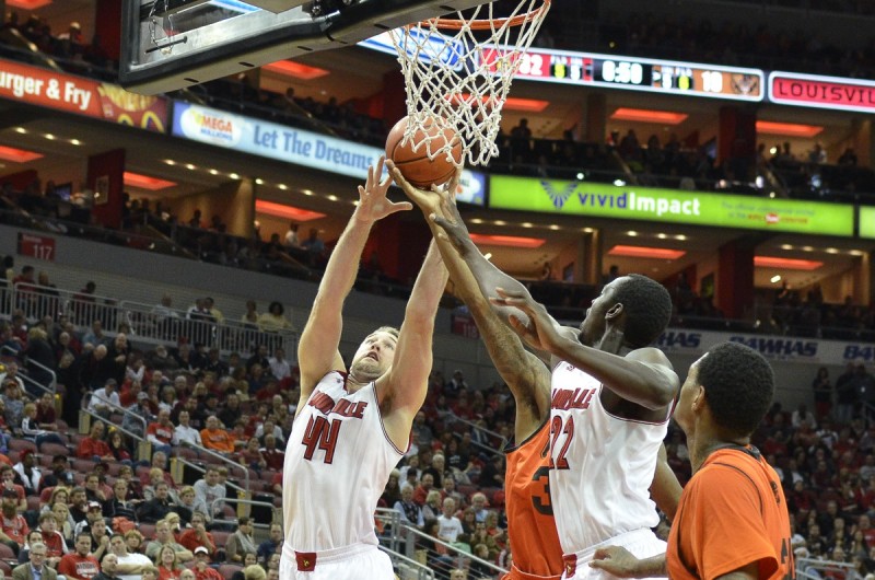 Louisville Forwards Stephen Van Treese (44) and Akoy Agau (22) go up for the rebound in the second half of last night’s final preseason exhibition against the University of Pikeville.