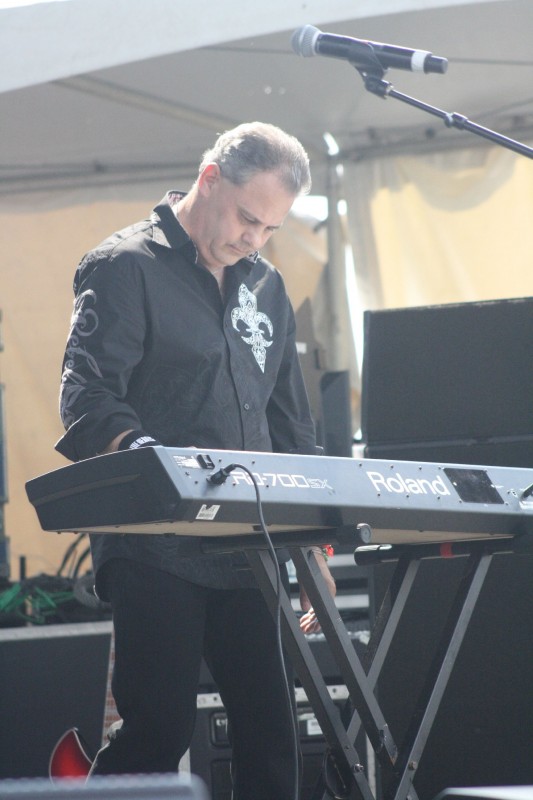 Eric Schlam on keys, helps with studio sounds at live shows