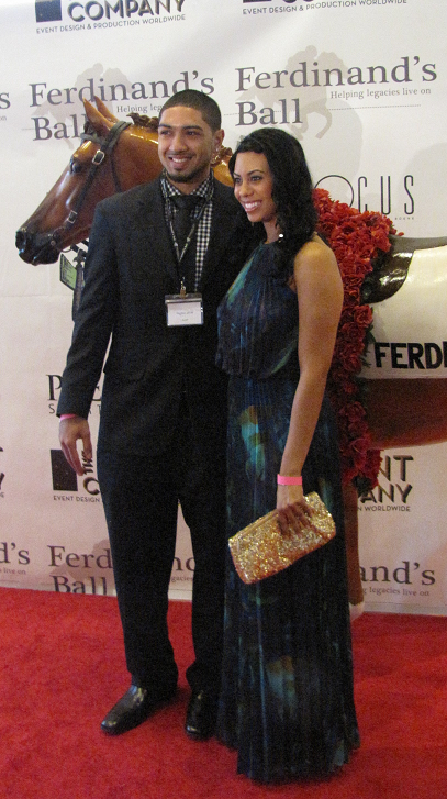 Peyton Siva and girlfriend Patience McCroskey walk the red carpet.