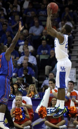 Marquis Teague rises for a three.