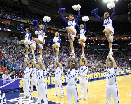 The National Champion cheerleaders do their part...