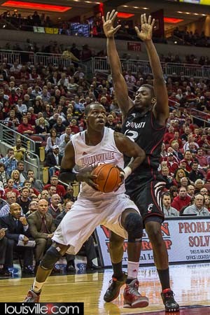 Gorgui Dieng drives around Cheikah Mbodj on the way to the basket.
