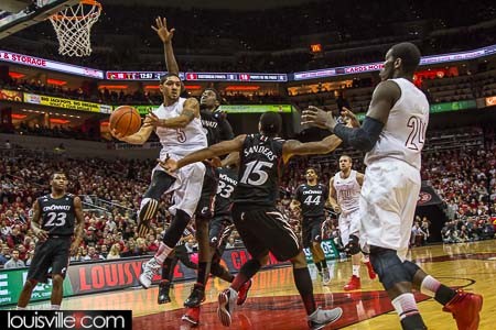 The dribble penetration makes for an open pass from Peyton Siva to Montrezl Harrell.