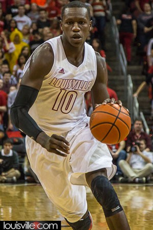 Gorgui Dieng puts the ball on the floor.
