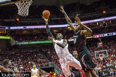 Gorgui Dieng takes a shot over Cheikh Mbodj.