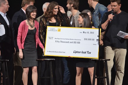 Lipton Iced Tea presenting their check for $50,000