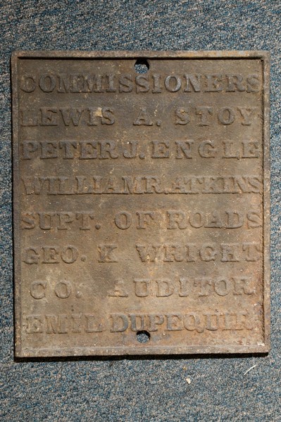 A plaque from the 1890&#039;s from the Floyd County Courthouse is one of many historical items that will be displayed at the new Corydon Pike location, Thursday, July 26, 2012, at Liquid Sound Studios in Greenville, Ind. (Photo by Brian Bohannon)