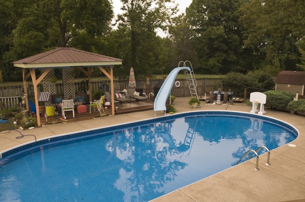 A deck and patio with swimming pool, one of the many amenities found at the 8-acre musicians&#039; compound, Thursday, July 26, 2012, at Liquid Sound Studios in Greenville, Ind. (Photo by Brian Bohannon)