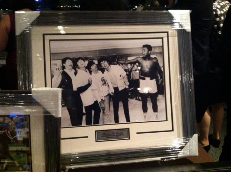 Photo of Muhammad Ali with the Beatles in auction.