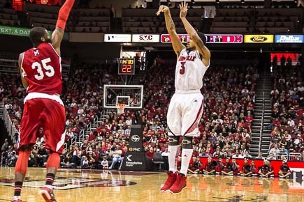 Peyton Siva launches one of his three point bombs.