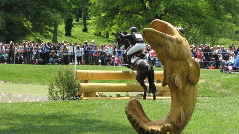 Whimsical wooden carved animals are always a hallmark of Rolex Kentucky cross country obstacles.