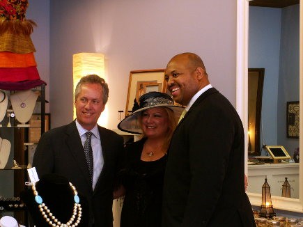 Les Filles Louisville owner Melissa Willis poses with Mayor Fischer and Councilman Tandy in her shop.
