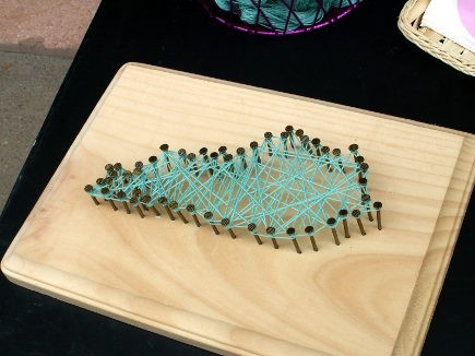 The string art that all guests could try their hand at creating.