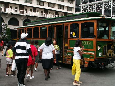 Passengers boarding a First Friday trolley at the Galt House.