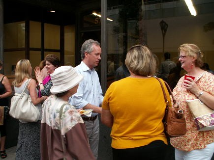 Mayor Greg Fischer greets constituents outside of Craft(s) Gallery.