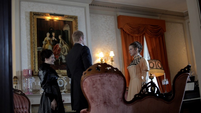 The cast meets in the parlour.