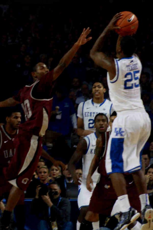 Teague shoots a three