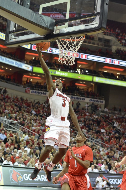 Louisville Guard Chris Jones goes up for an easy layup in the first half