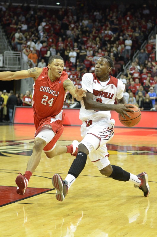 Louisville Guard Terry Rozier dribbles past the defence. Rozier scored only 2 points in 11 minutes against the Bears