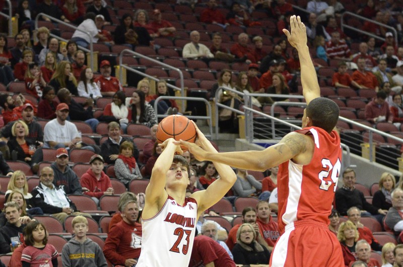 David Levitch shoots a three pointer late in the game against the Cornell Bears tonight in the KFC Yum! Center