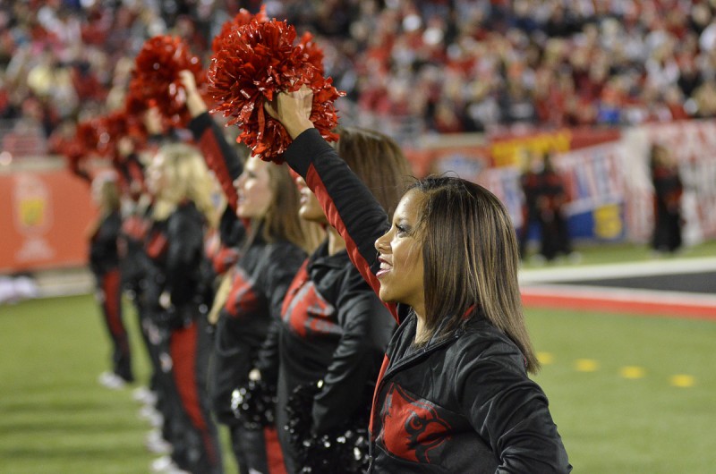 Louisville cheerleaders cheer on the team from the sidelines during the game against Houston