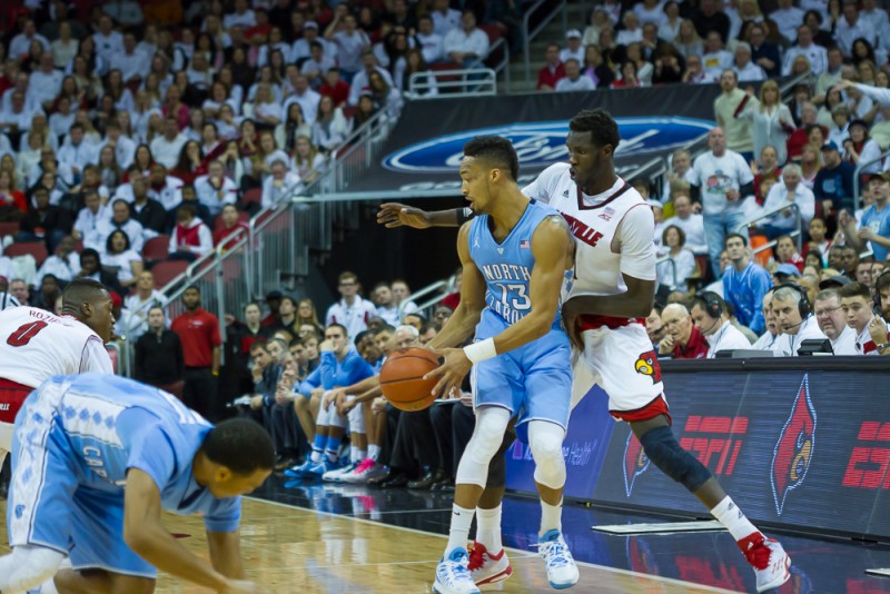 J.P. Tokoto tried to dribble away from Mangok Mathiang.