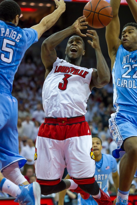 Chris Jones contested on his way to the rim by Marcus Paige and Isaiah Hicks.
