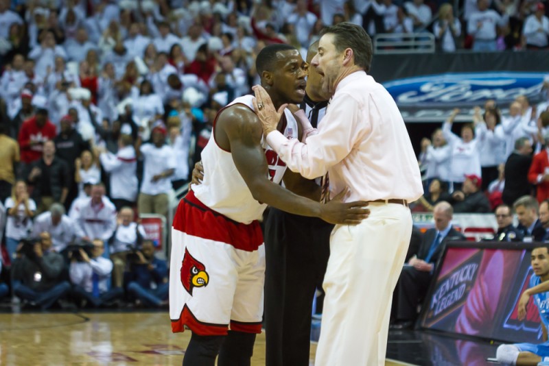 Chris Jones and Rick Pitino discussed strategy.