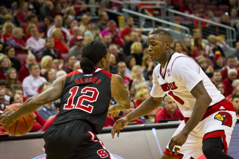 The unstoppable Anthony Barber (12) found himself again at odds with Terry Rozier (0).