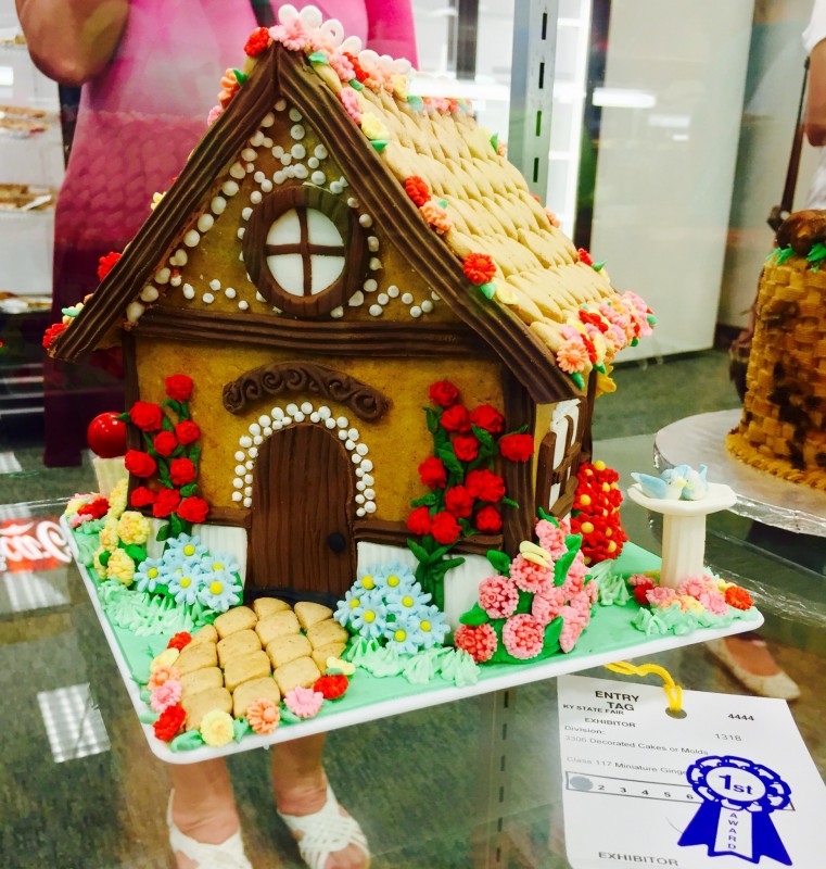 Maria Kay Robertson won first prize with her adorable gingerbread house.