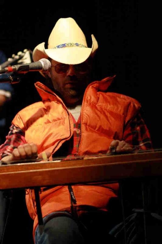 Never underestimate the man playing steel guitar