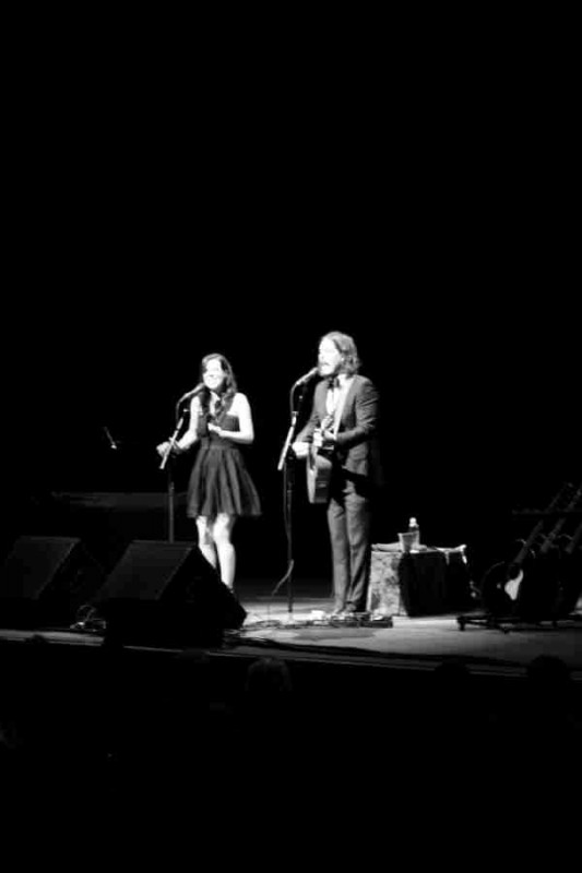 Alone on a stage, they would not have it any other way