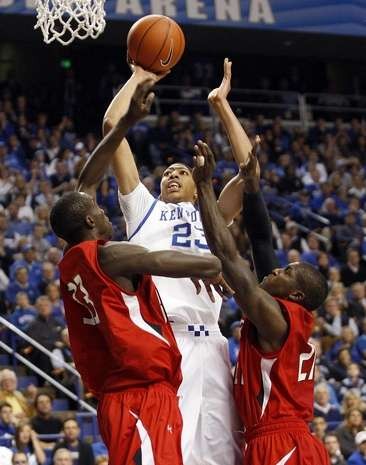 Davis propels himself over the defenders