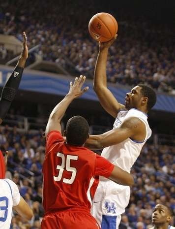 Jones is on the offense as he takes it to the bucket