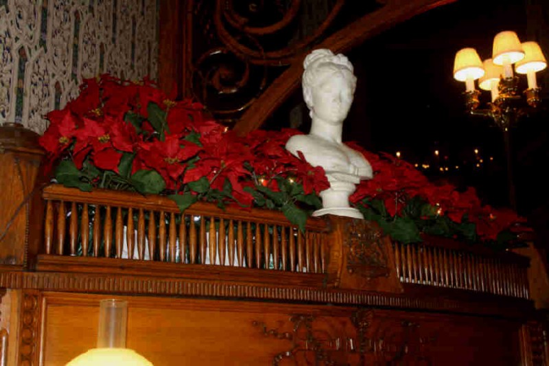 The poinsettias are lovely with the wood