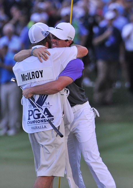 Rory McIlroy and his caddie JP Fitzgerald celebrate his win at the 2014 PGA Championship, at Valhalla Golf Club, on August 10, 2014 in Louisville, KY