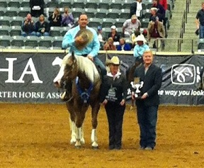 Shawn Flarida slides in to win the individual 2012 Ariat Kentucky Reining Cup CR