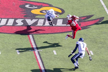 The Louisville Cardinals go down in triple overtime 23-20
